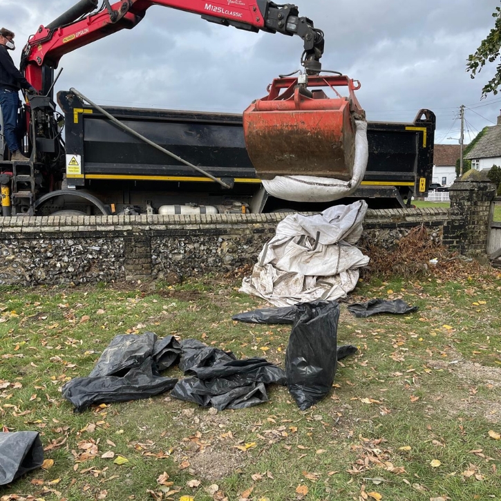 Specialist carrying out professional guano cleaning on a rooftop