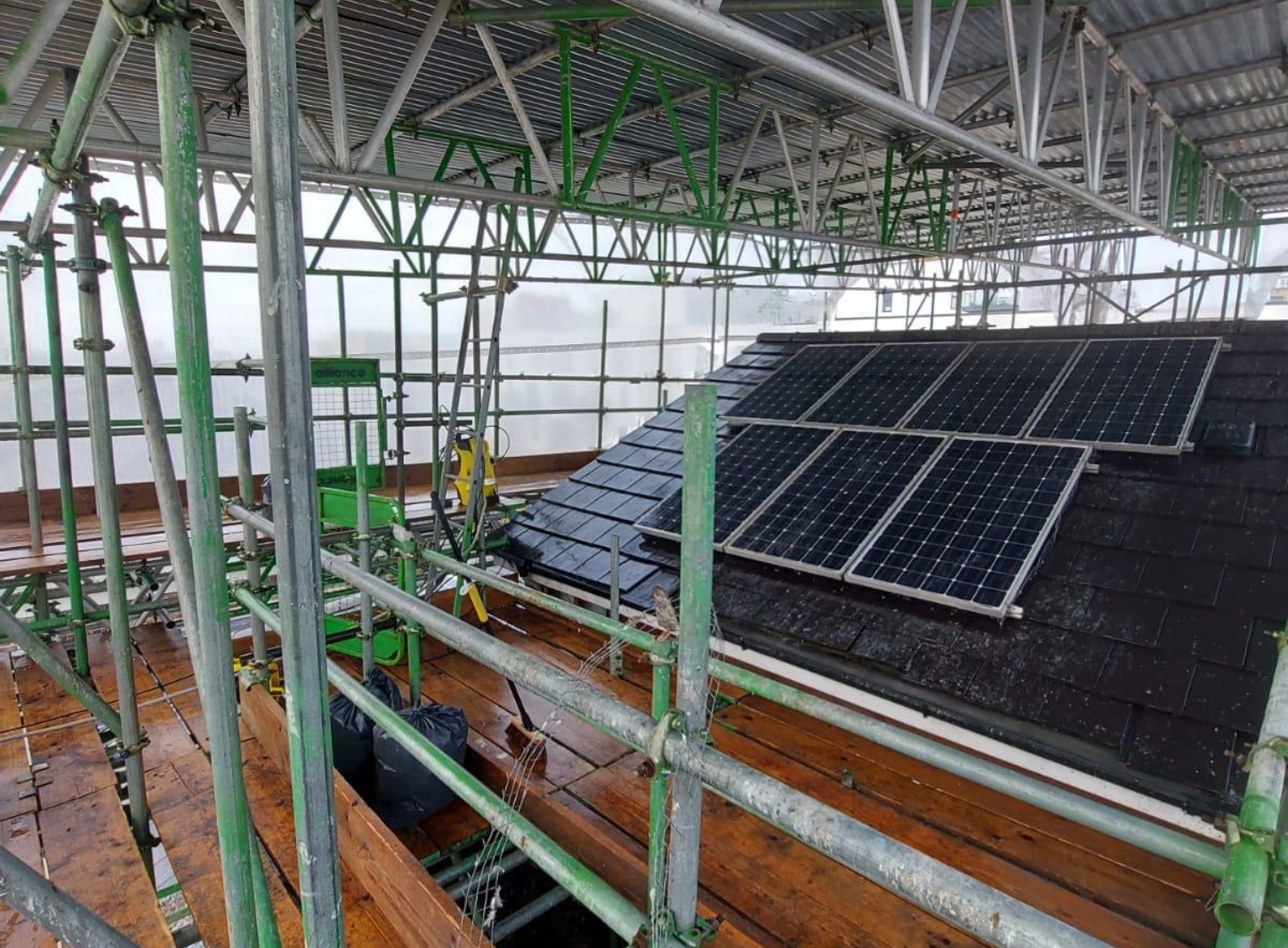 Bird control specialist inspecting a commercial property